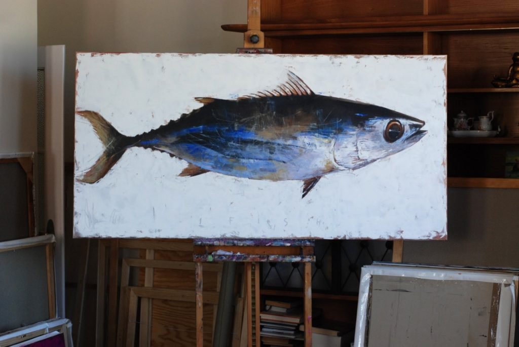 Igor Shulman fish painting displayed on easel in studio environment