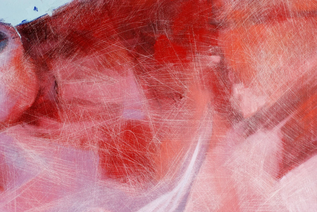 Red tonal transitions from deep crimson to lighter pink areas