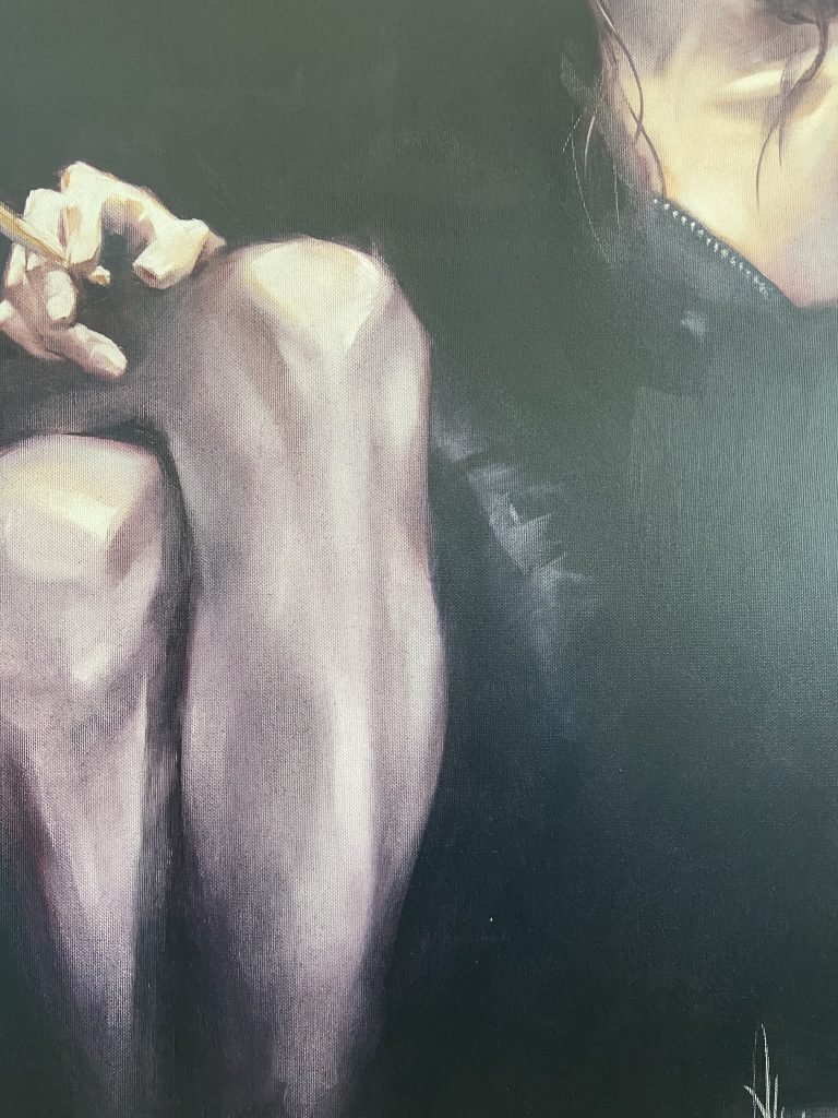 Woman's Hand Holding a Joint