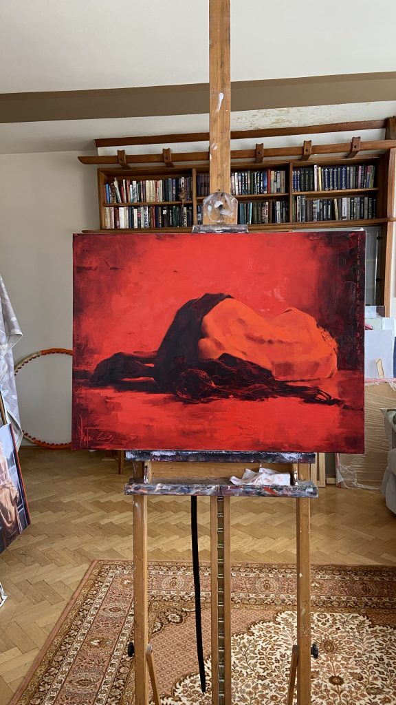 Original Igor Shulman oil painting on easel showing full red landscape canvas