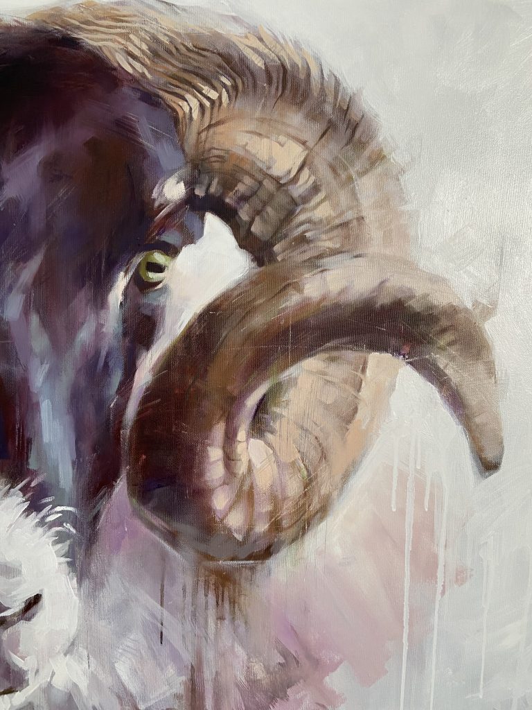 Pale background with visible paint drips and wash strokes alongside the ram's shoulder