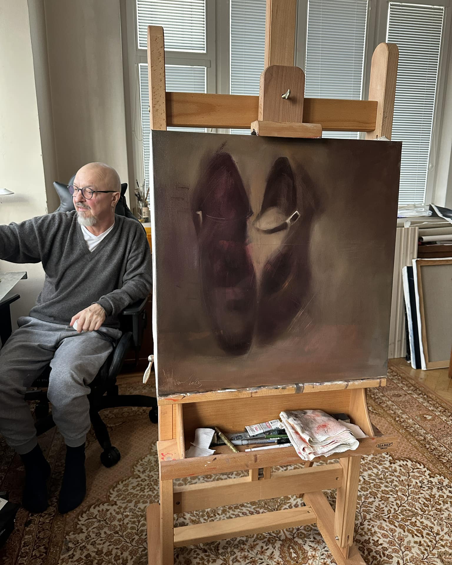 Igor Shulman with the Shoe Dreams 2 Oil Painting at his studio
