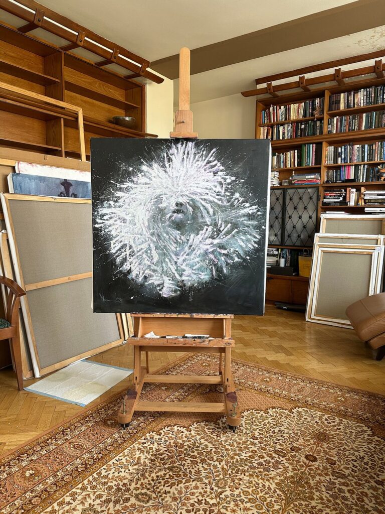 Igor Shulman’s White Simphony oil painting displayed on an easel in the artist’s studio.