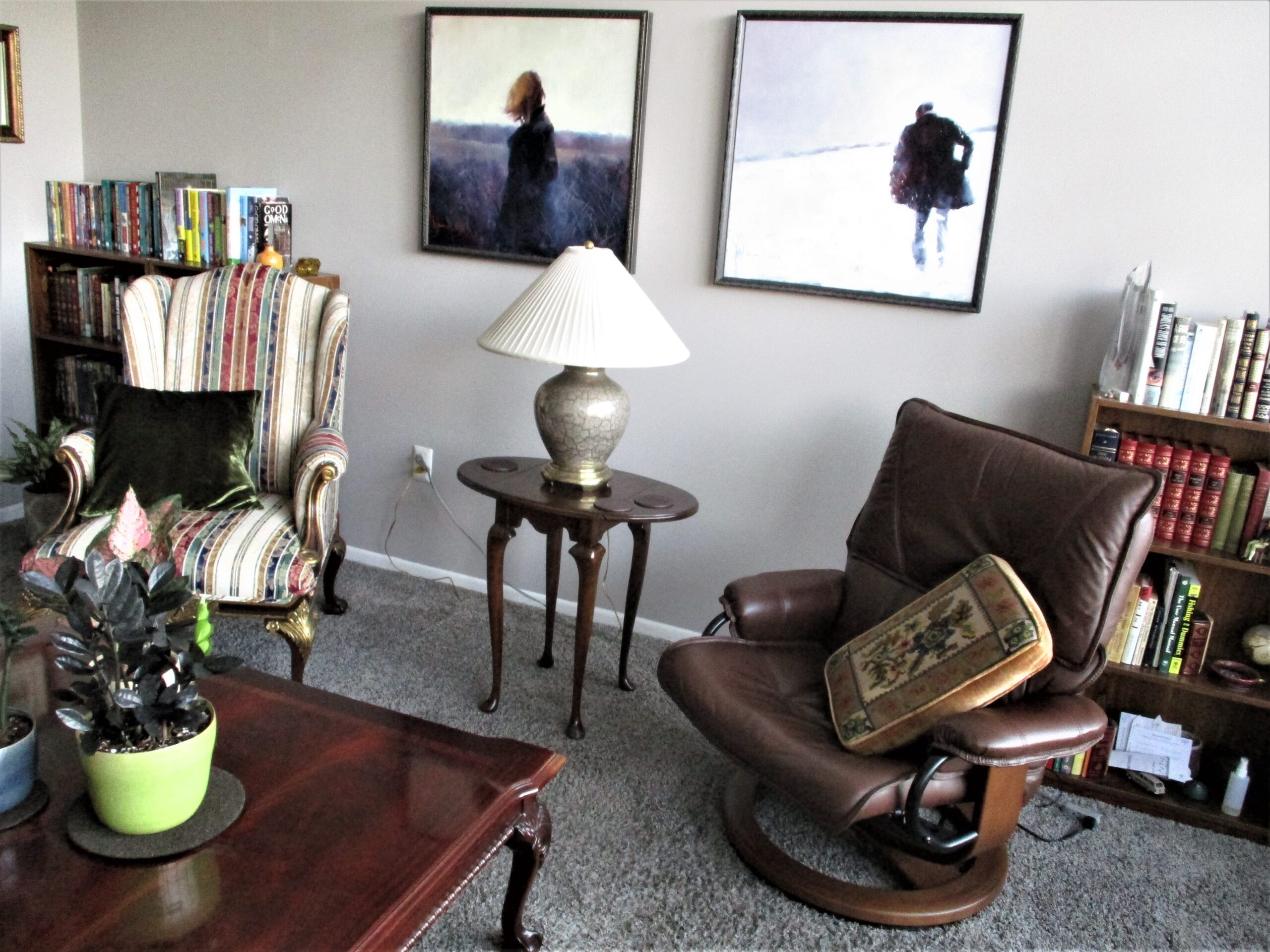 Painting It’s a Strange Place by Igor Shulman alongside A Sunken Horizon in Connie’s home