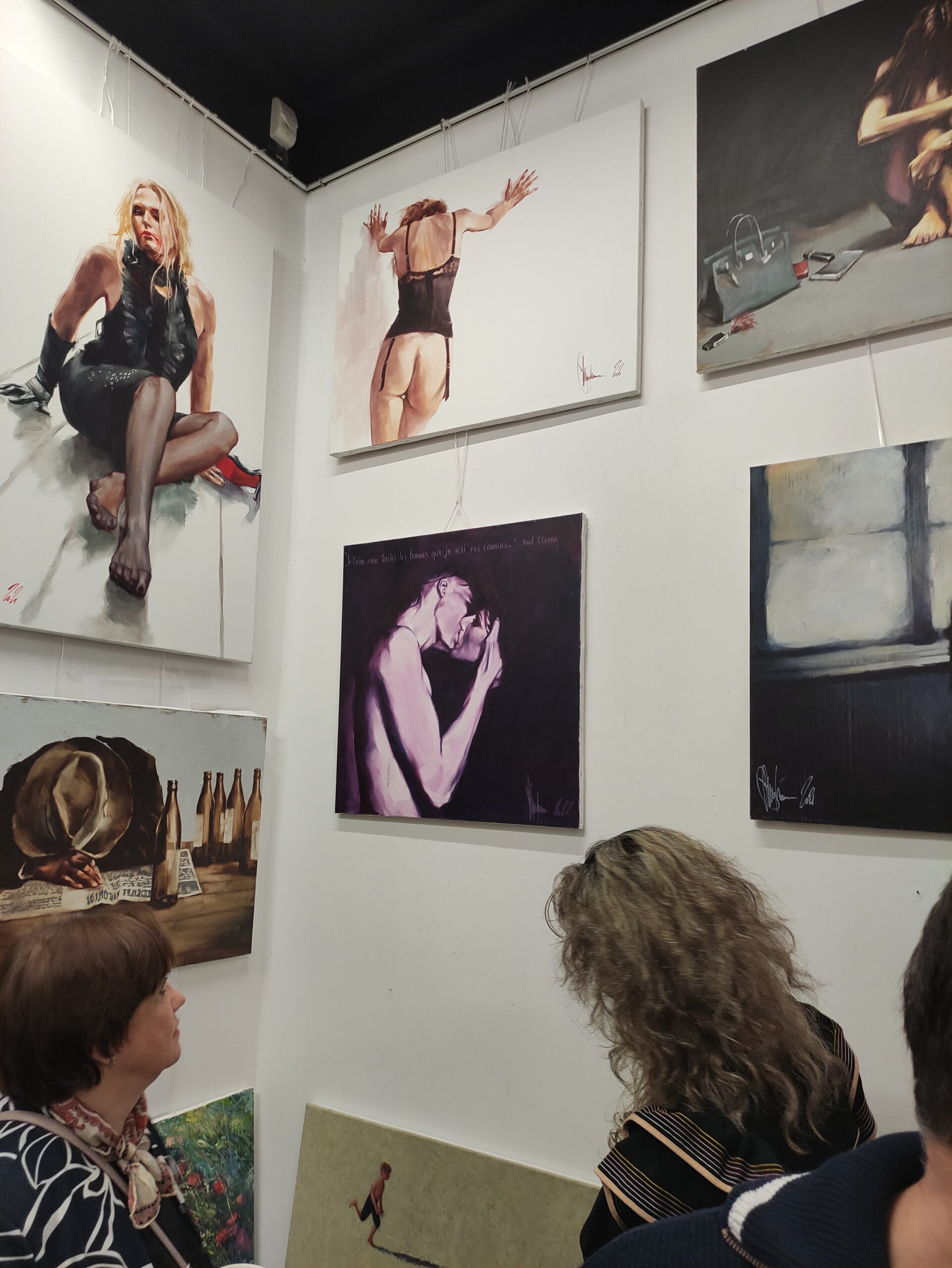 Visitors appreciating Igor Shulman’s paintings at ART Gallery 11 Prague exhibition