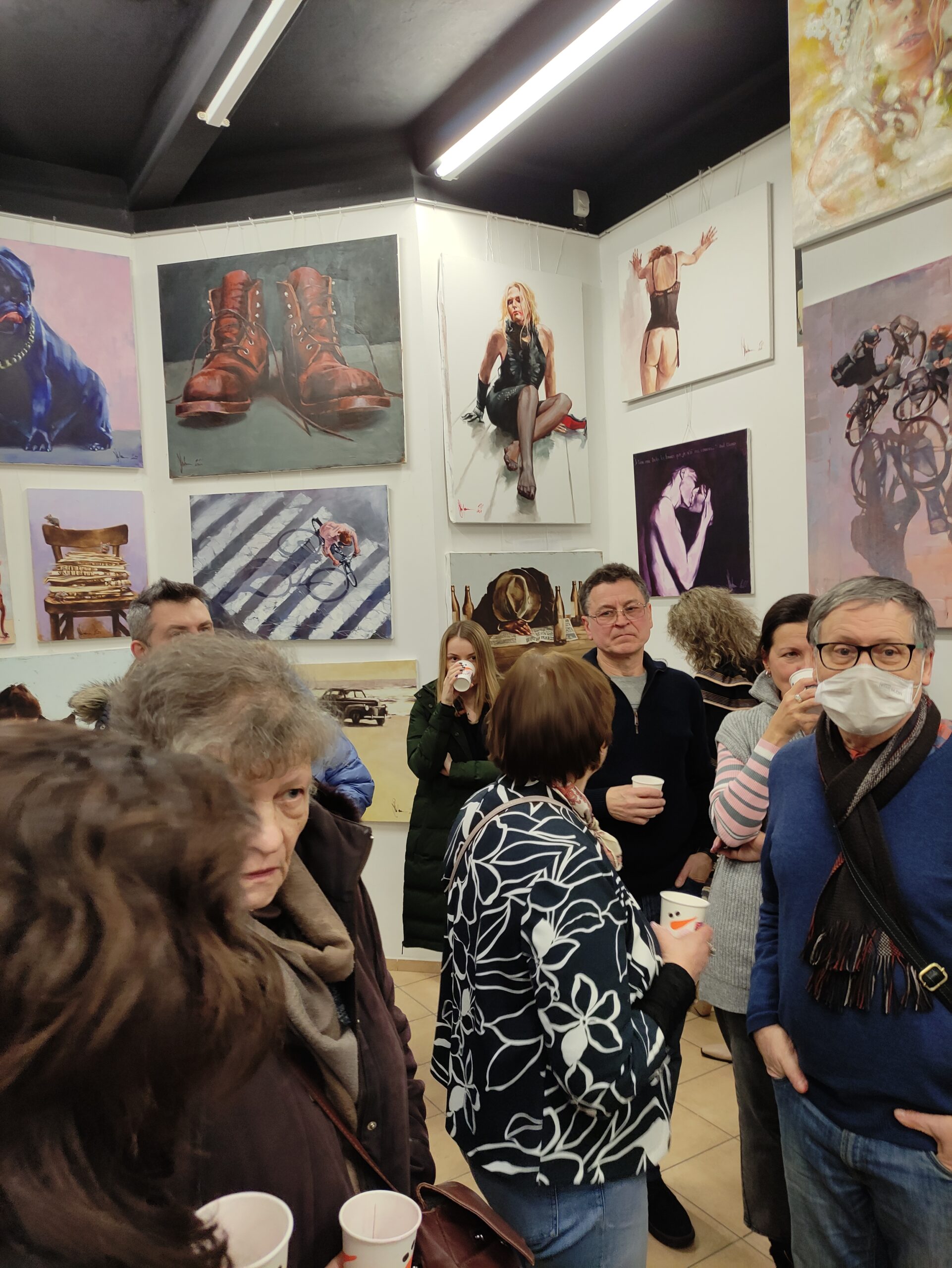 Visitors enjoying the Igor Shulman art exhibition at ART Gallery 11 Prague
