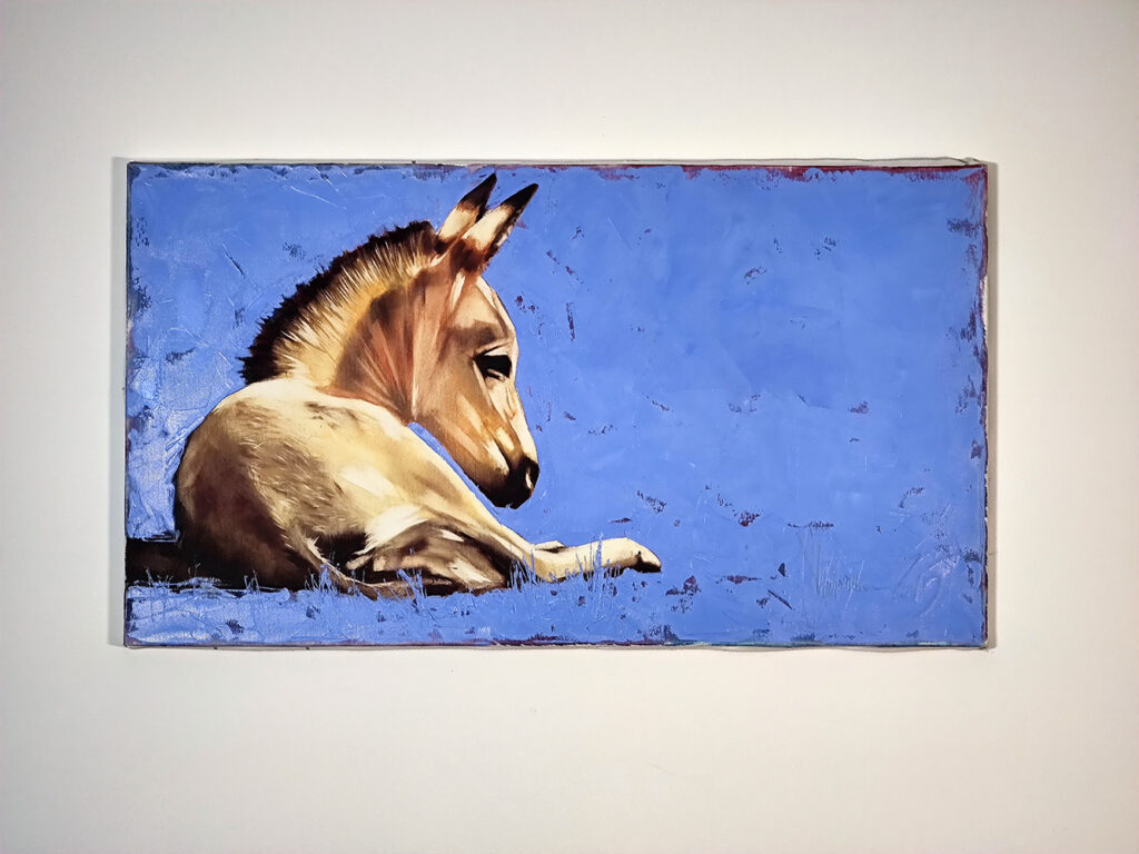 Self-Portret #5 by Igor Shulman displayed on an interior wall